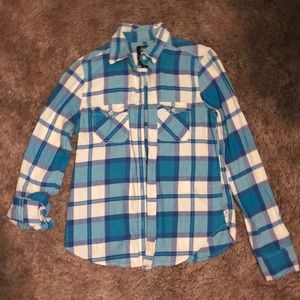 white and blue flannel